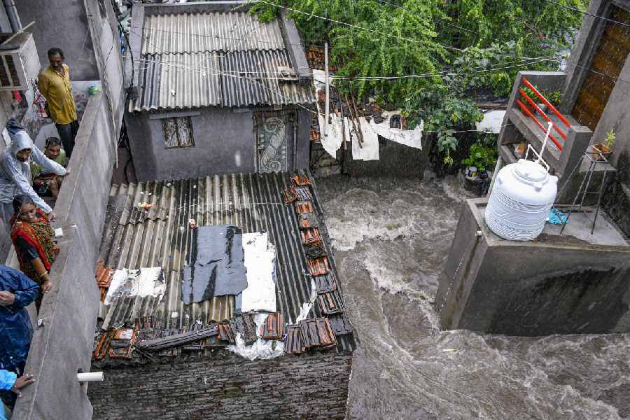 Waterlogging at an area after heavy rains, in Rajkot, Tuesday, Aug. 27, 2024.