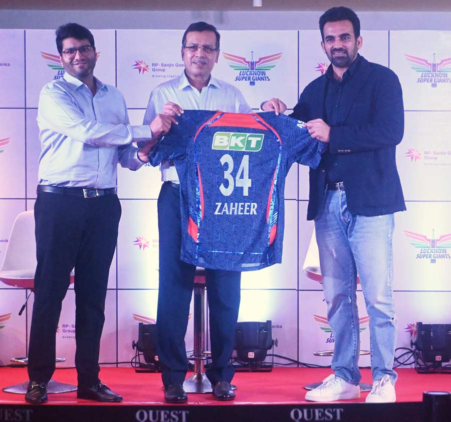 Lucknow Super Giants head coach and former Team India cricketer Zaheer Khan, along with RPSG Group's Sanjeev Goenka and Shashwat Goenka of the RPSG Group, launches the official team jersey in Kolkata on Wednesday