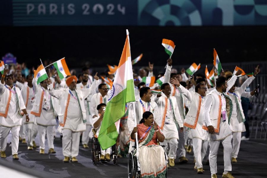 Flagbearers Bhagyashri Mahavrao Jadhav of India and Sumit of India lead their contingent during the Opening Ceremony for the 2024 Paralympics, Wednesday, Aug. 28, 2024, in Paris, France.
