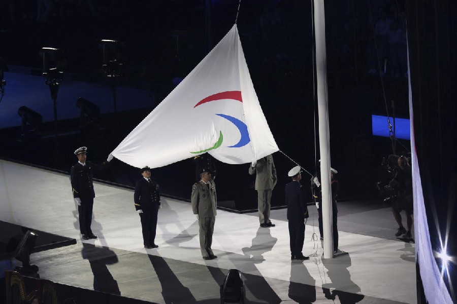 The Paralympic flag is raised during the Opening Ceremony for the 2024 Paralympics, Wednesday, Aug. 28, 2024, in Paris, France.