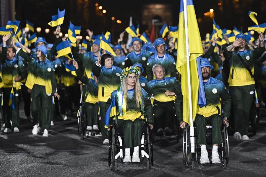 Ukraine's delegation arrives during the Parade of Nations as part of the Paris 2024 Paralympic Opening Ceremony at the Place de la Concorde in Paris, France, Wednesday, Aug. 28, 2024.
