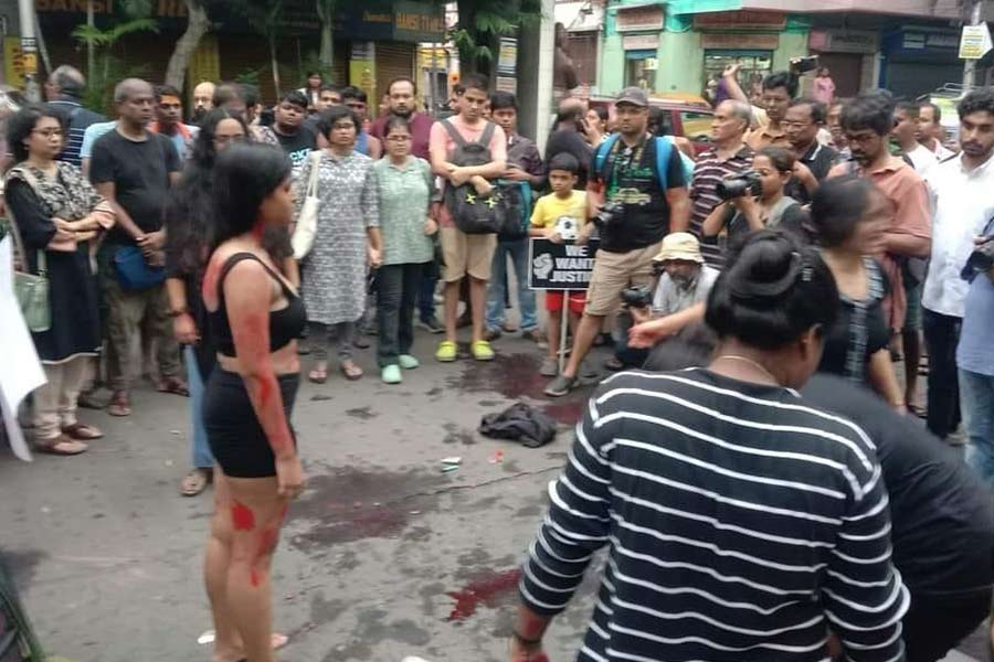 Jhil performs the play in front of Girish Bhawan on August 25