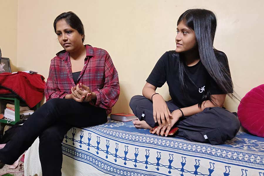 Sanjita, left, with her daughter Jhil at home this week