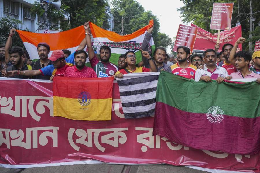 Supporters of football clubs Mohun Bagan, East Bengal and Mohammedan Sporting Club during a protest rally against the alleged rape and murder of a trainee woman doctor at RG Kar Medical College and Hospital, in Calcutta, Thursday, Aug. 29, 2024.