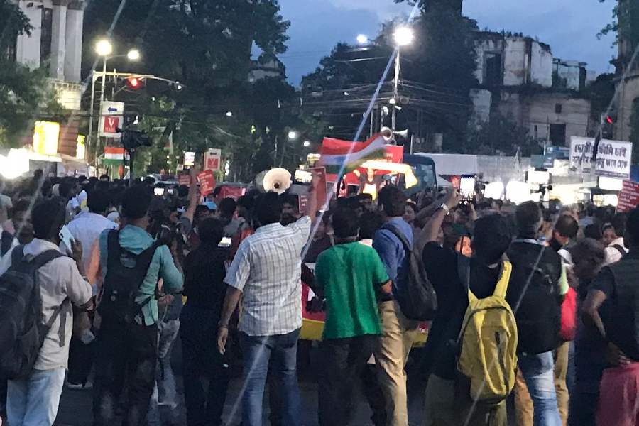 Protesters at SN Banerjee Road-Esplanade crossing, in Calcutta, Thursday, Aug. 29, 2024.
