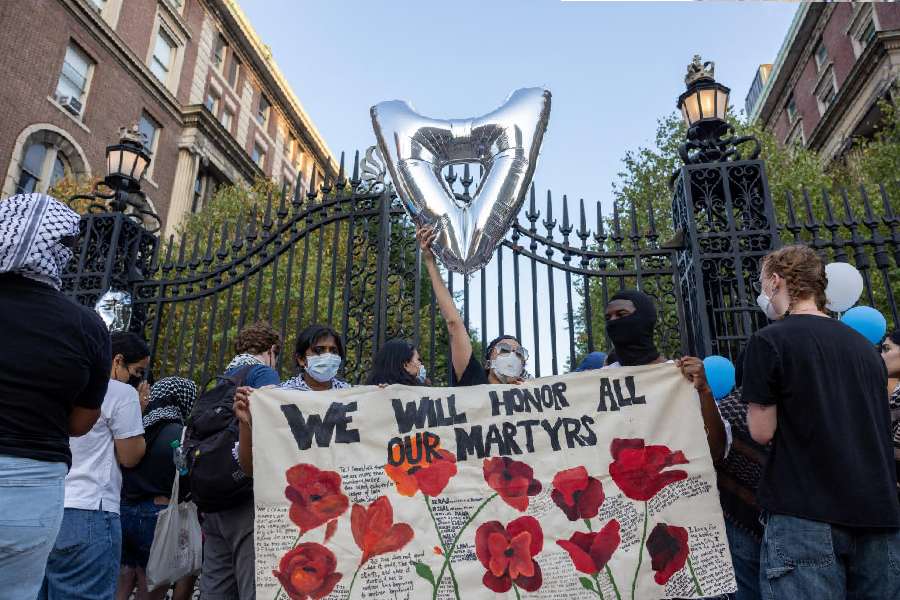 Protesters gather at a main entrance in front of Columbia University during convocation, amid the ongoing conflict in Gaza between Israel and Hamas, in New York City, U.S., August 25, 2024
