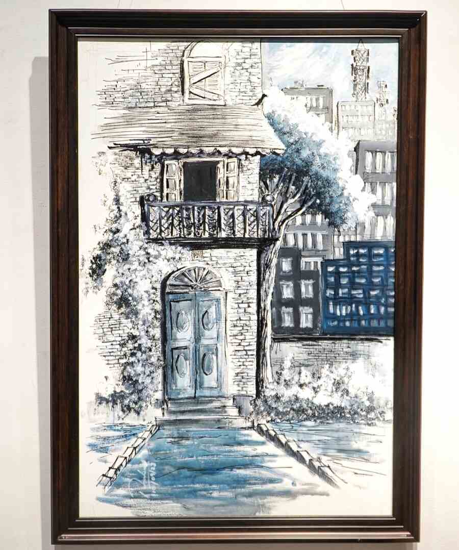 This lone architectural treasure of a feudal house, with one of its windows shuttered, stands testament to decades of change and development, with a solitary crow perched atop the balustrade