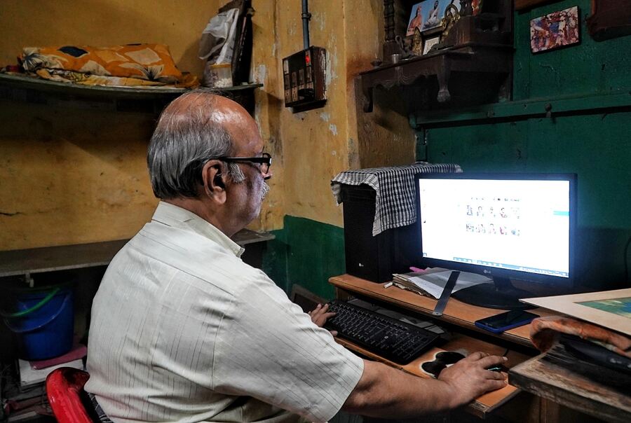 The studio is behind restoration of photographs of several historical personalities like Sri Ramakrishna Paramhansa and Swami Vivekananda. The archive, unfortunately, no longer exists today. (Above) Samar Chatterjee, the current owner of C. Bros., at work in his shop 