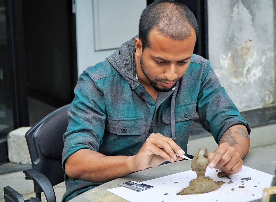 Software developer Debjit Dhar decided to find his own inspiration, creating a clay representation of his favourite superhero, Batman. “As someone with ADHD, playing with clay is very relaxing and calming for me. I’m learning a lot in this workshop,” Dhar said. In addition to his fingers, he also used an expired credit card for detailing 