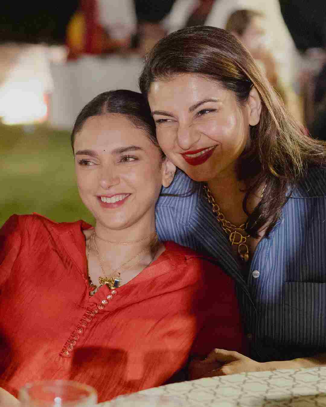 Dressed in a red suit, Aditi was all smiles during the festivities.