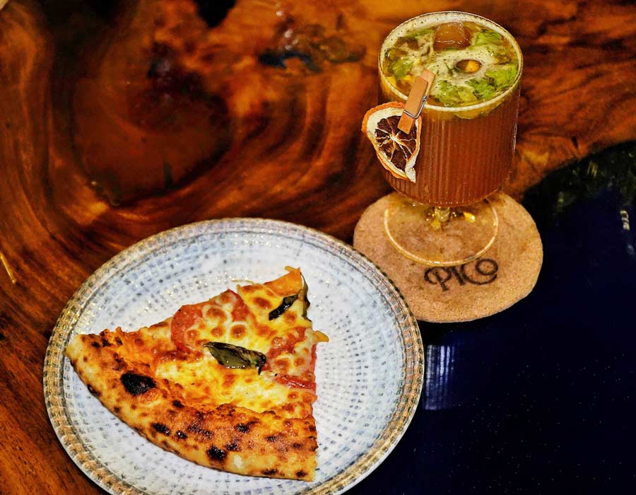 First up on the big platter from PICO is their classic hand-tossed Neapolitan-style Margherita pizza, with its perfectly blistered crust. It is paired with an Orange Concoction, a refreshing mix of coffee and fresh orange juice — a PICO speciality for non-coffee drinkers. The dried orange garnish clipped to the side of the drink adds an unexpected twist