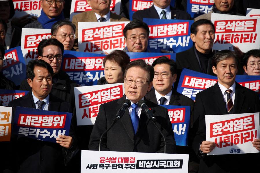 South Korea's main opposition Democratic Party leader Lee Jae-myung, lawmakers and people attend a rally to condemn South Korean President's surprise declarations of the martial law.