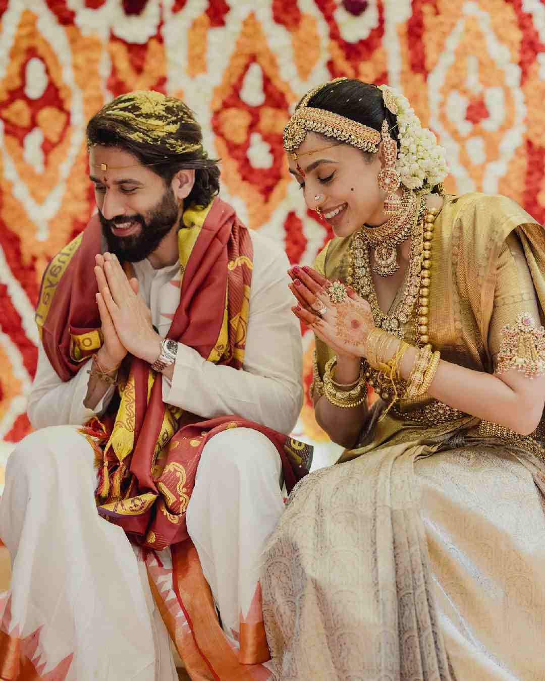 While Chaitanya donned a white kurta, Sobhita looked gorgeous in a golden silk sari.  