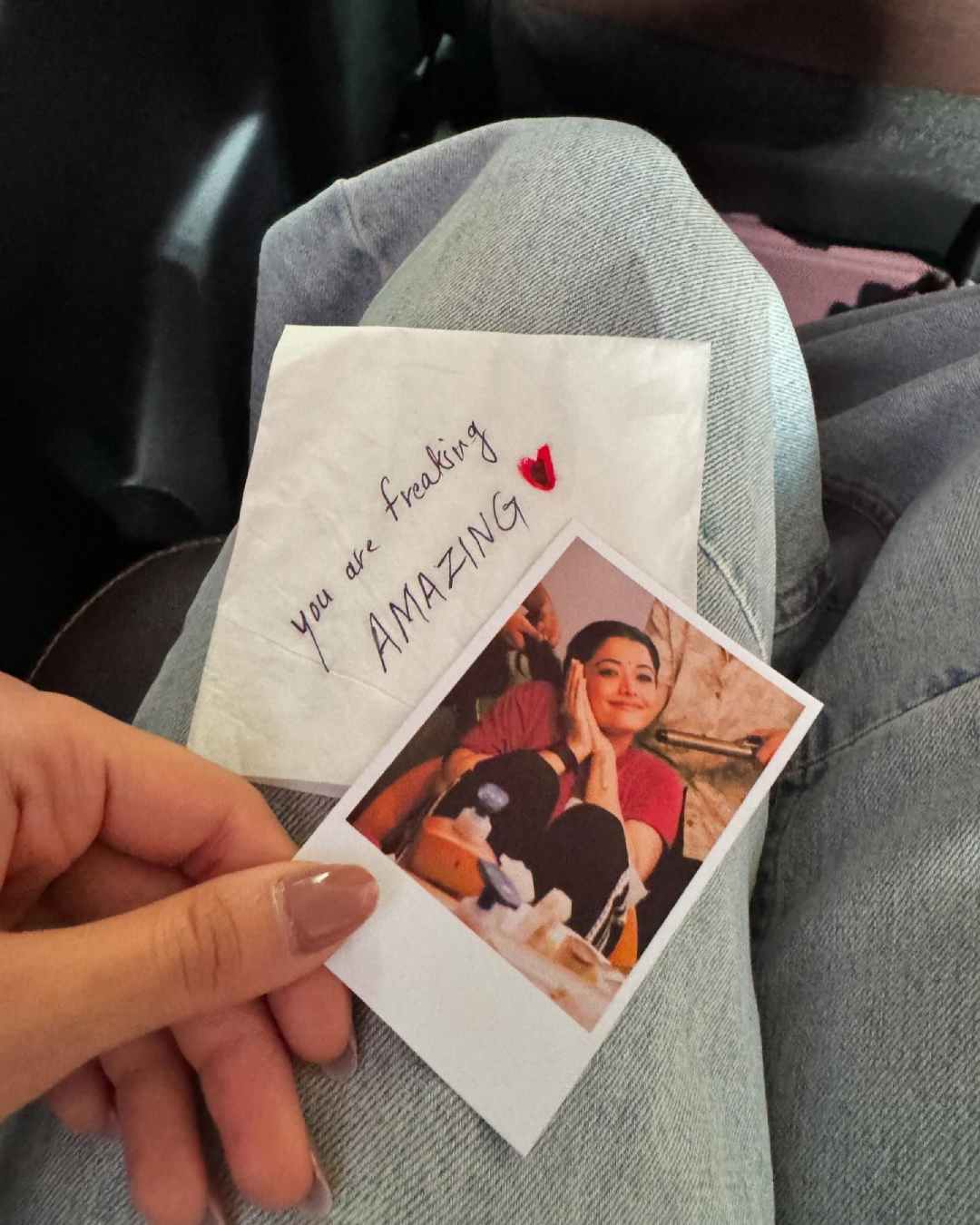 The last photo in Rashmika’s Instagram carousel included a polaroid picture of her from her makeup room. A napkin carrying the words “You are freaking amazing” also appears in the picture.