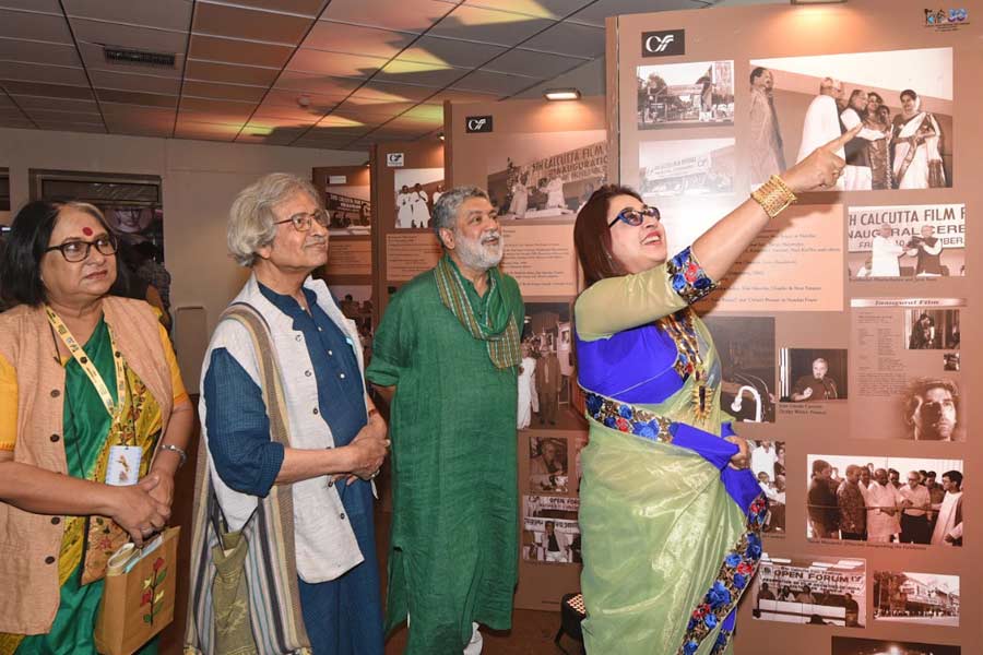 Actress Satabdi Roy, artist Jogen Chowdhury, film director Sudeshna Roy along with others at the exhibition 'KIFF: A Journey of 30 years' at Gaganendra Pradarshashala on Thursday