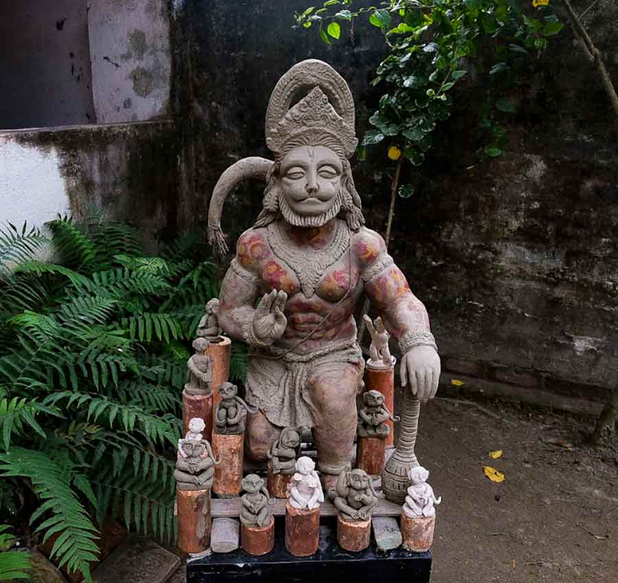 The sculpture of Hanuman, an deity in Indian mythology, along with the small human and animal figures, are by local artist Rahul Sardar