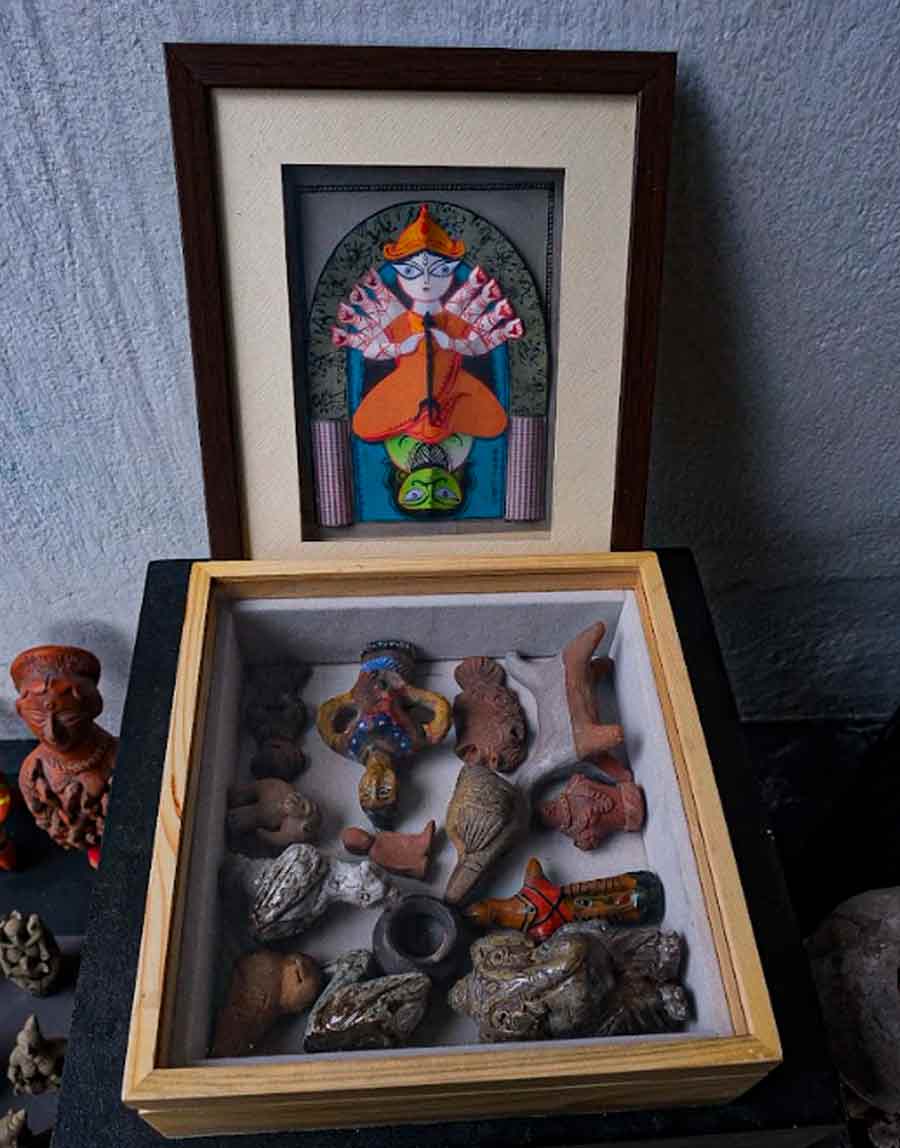 Museum box — a coming together of human and animal sculptures in a concise space — comes from the personal collection of Studio Calyx. It makes one marvel at the diversification of nature and ponder on the global climate crisis as well. The Durga artwork is made with paper by Bhattacharya. The presentation of Durga, human and animals in one space reminds of how the Indian deity’s family form includes wildlife and various facets on nature