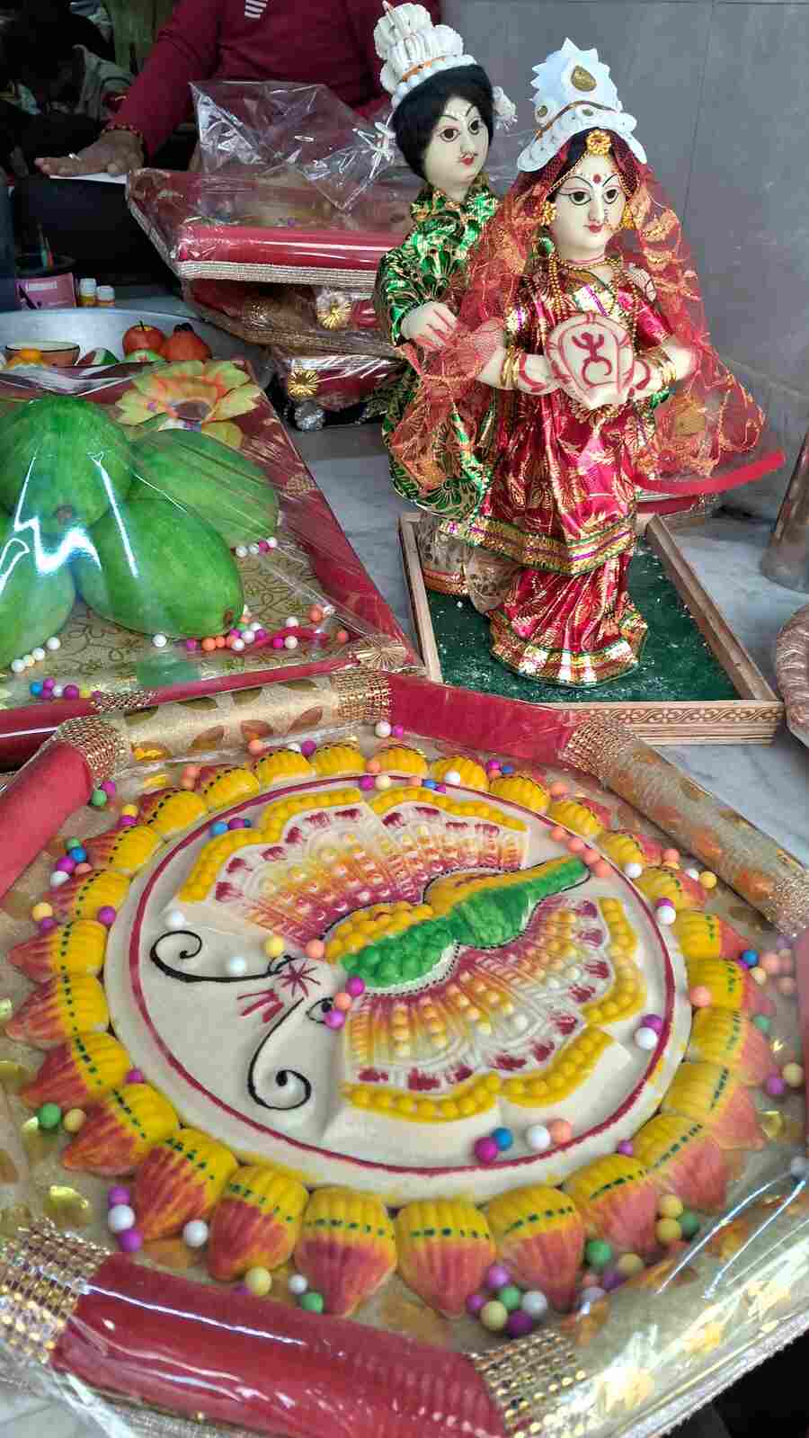 Bride and groom and an array of Bengali sweets made of ‘kheer’ (thickened milk) are popular during the wedding season in West Bengal. Seen in the picture are such ‘tattwa’ sweets specially made at a shop on Rabindra Sarani  