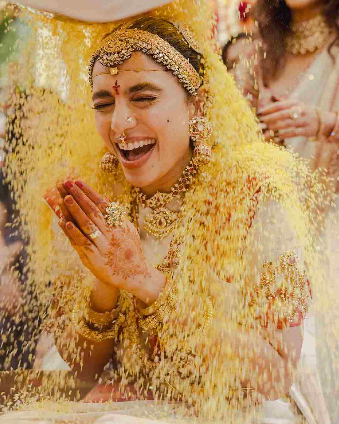Rice is showered on the bride as part of the rituals. Sobhita and Chaitanya’s wedding celebrations kicked off with the Godhuma Raayi Pasupu danchatam ritual, which took place in October. 