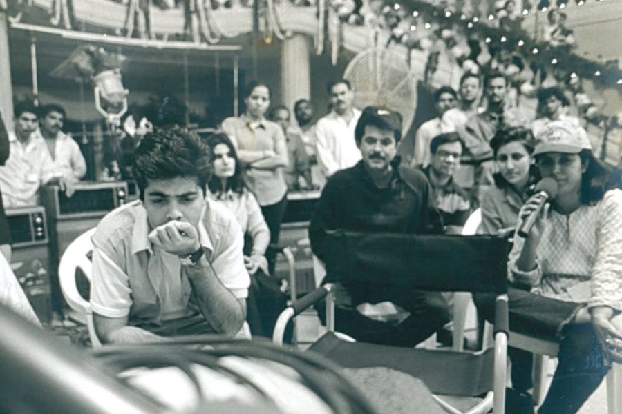 A monochrome picture shows Karan engrossed in directing a film. Farah Khan and Anil Kapoor also appear in the frame.