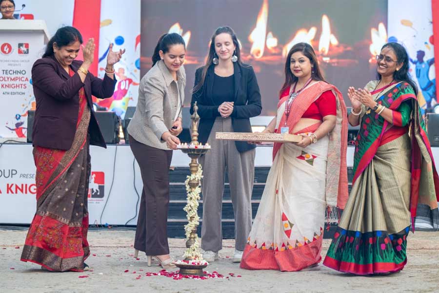 Anjum Moudgil, Olympian and shooter; Manoshi Roychowdhury, co-chairperson, Techno India Group; and Pauline Laravoire, sustainability director, Techno India Group; light the torch at the opening ceremony of the fourth edition of Techno Olympica Knights, a premier inter-school sports competition  