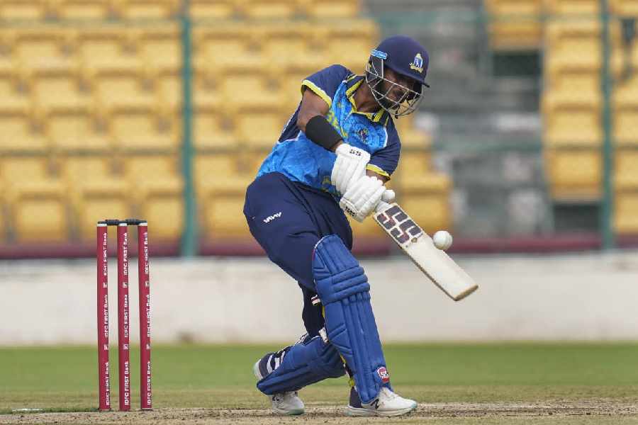 Bengal’s Shahbaz Ahmed plays a shot during the first quarter-final cricket match of the Syed Mushtaq Ali Trophy between Baroda and Bengal, at the M Chinnaswamy Stadium, in Bengaluru, Wednesday, Dec. 11, 2024.