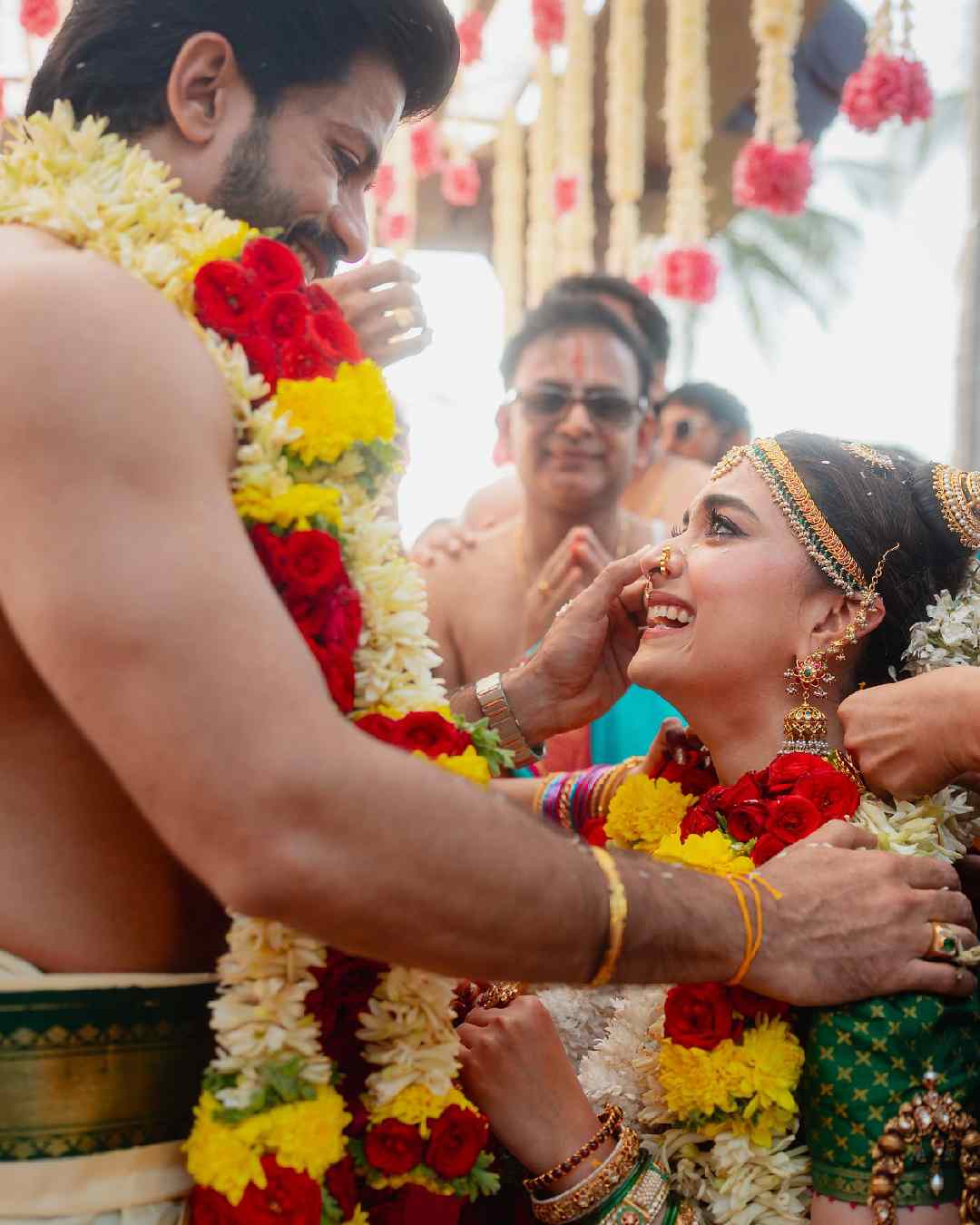 In another picture, Antony wipes Keerthy’s tears. Clad in a green-and-yellow embroidered sari, the actress appears overwhelmed with joy on her special day. 