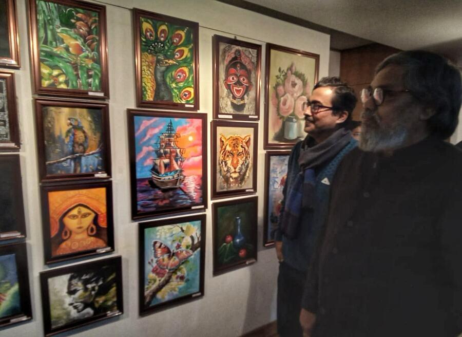 Visitors check out some of the 215 paintings by students at the Annual Art Exhibition 2024-25 of Delhi Public School Ruby Park at the ICCR Abanindranath Gallery. It is being held between December 13 and 15