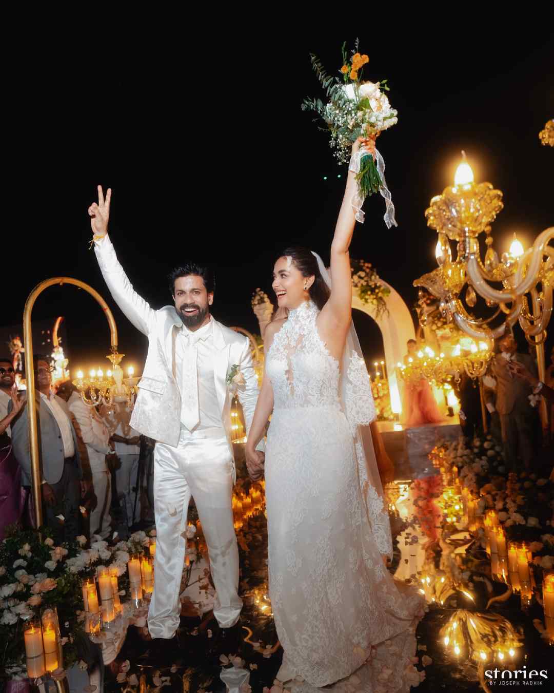 While Antony made a victory gesture with his fingers, Keerthy held up a bouquet of flowers after the wedding. 