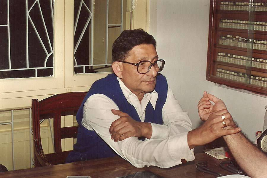 The late Prasanta Banerji checking a patient’s pulse. Banerji conceptualised The Banerji Protocols of Treatment, and also set up the present-day practice on Elgin Road