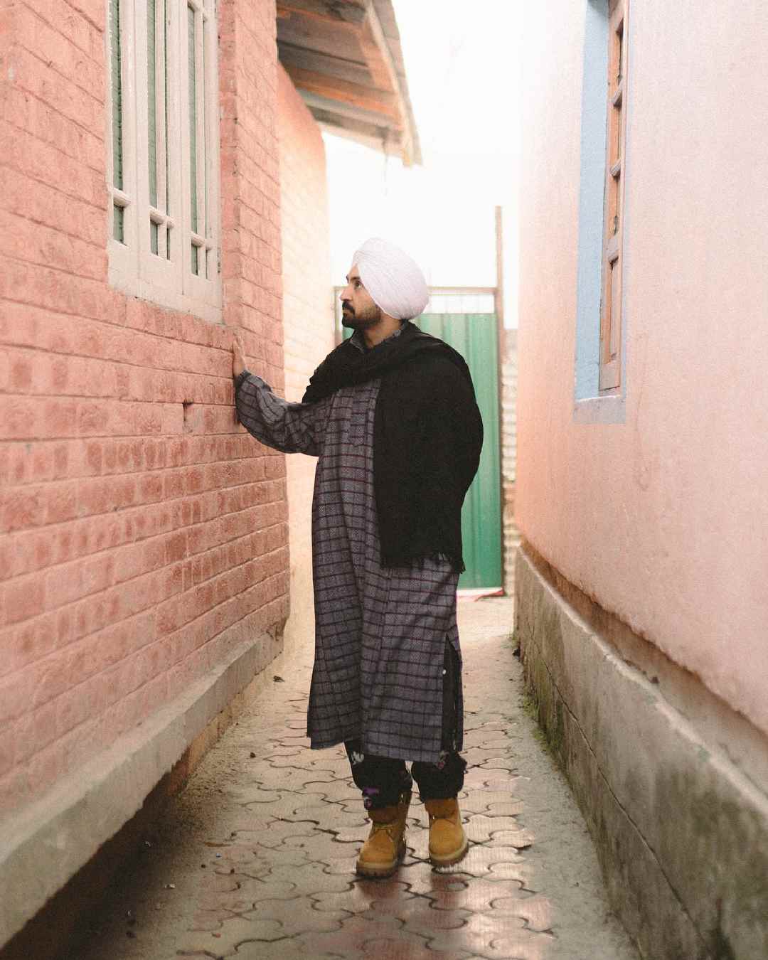A picture shows Diljit walking through the lanes of Kashmir. The 40-year-old musician recently addressed a controversy surrounding his use of the spelling ‘Panjab’ instead of ‘Punjab’.