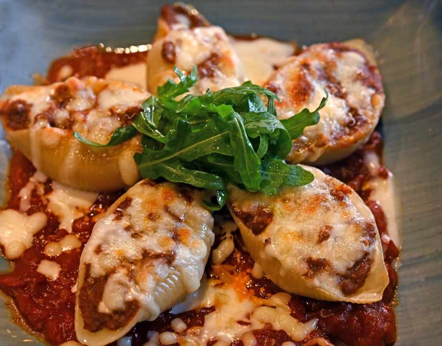 The Conchiglie al Forno is for meat lovers. The shell pasta is stuffed with mutton ragu (minced meat cooked with tomatoes), served in a tangy tomato salsa and topped with cheese