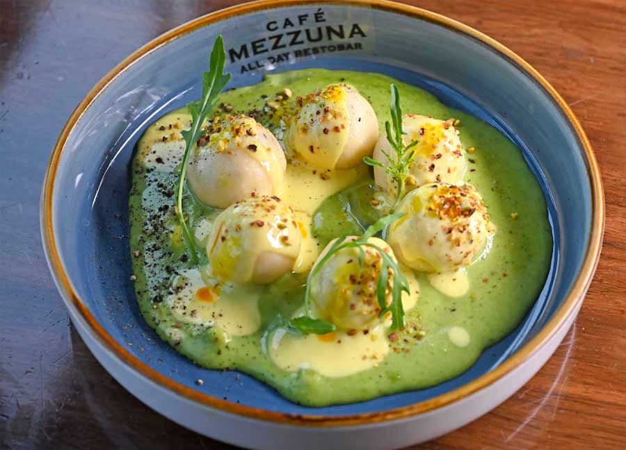 The Gnudi pasta on the menu is a cousin of gnocchi. Instead of potato flour, semolina is used to make this soft Italian dumpling. The vegetarian pasta dish has a nutty pistachio pesto, drizzled with lemon butter sauce, and topped with crispy artichoke crumbs