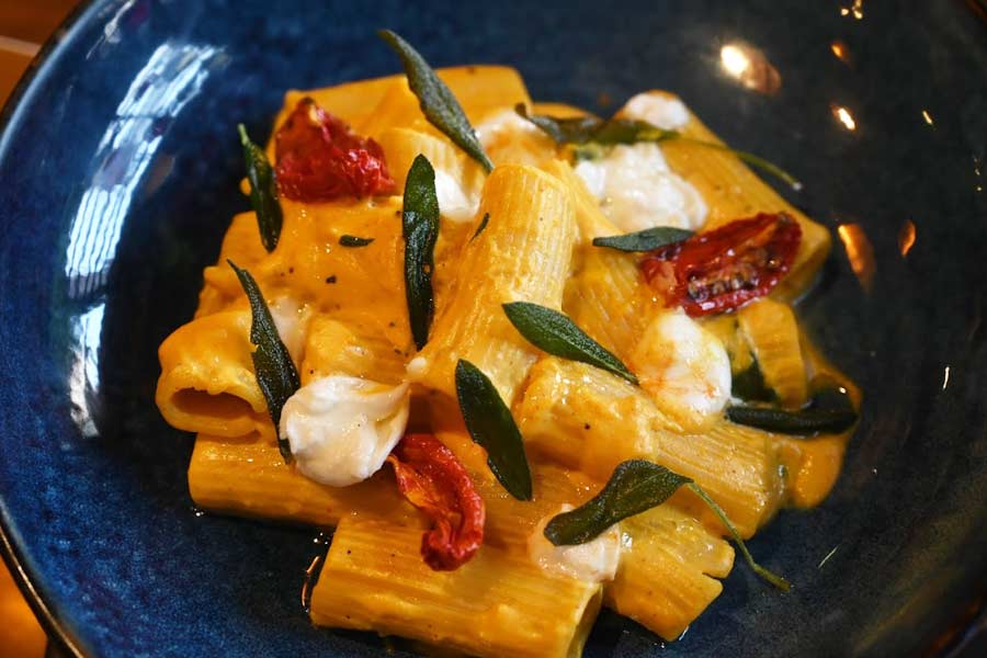 Rigatoni is penne with a shot in the arm. The dish at Mezzuna is served with butternut squash cream and herby sage butter. Bits of fresh burrata on the top adds to the creaminess 