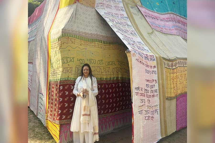 The author outside the installation ‘Kanthar Ghar’ by Rabiul Khan, Surajit Mudi, Ritusree Mondal and Himangshu Sarma (GABAA), in Santiniketan