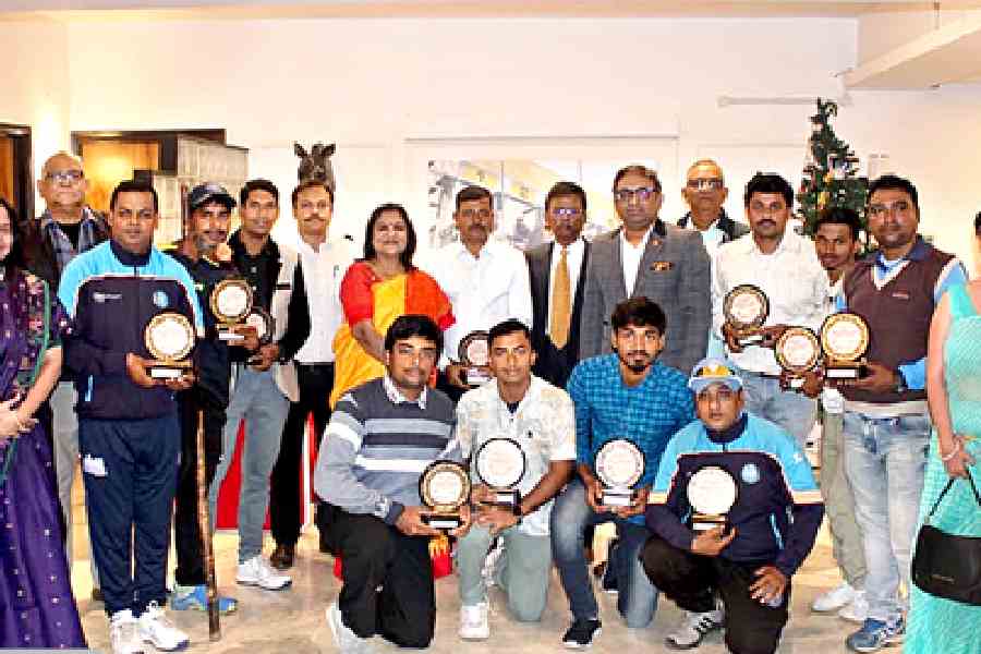 The cricketers who were felicitated during the event to mark International Day of Persons with Disabilities and other guests on Wednesday