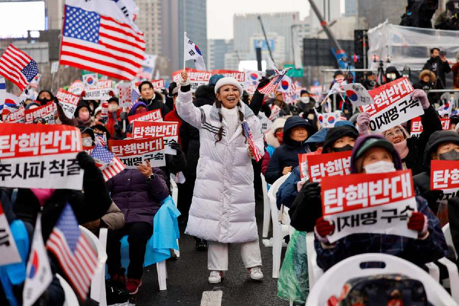 Protestors who want Yoon Suk Yeol to continue as the President of South Korea. Reuters