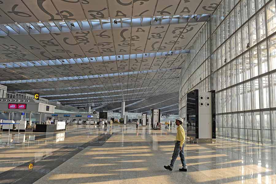The ceiling of the new terminal of NSCBI Airport had images of the Bengali alphabets in black, lending a unique look to the vibrant interiors of the airport 