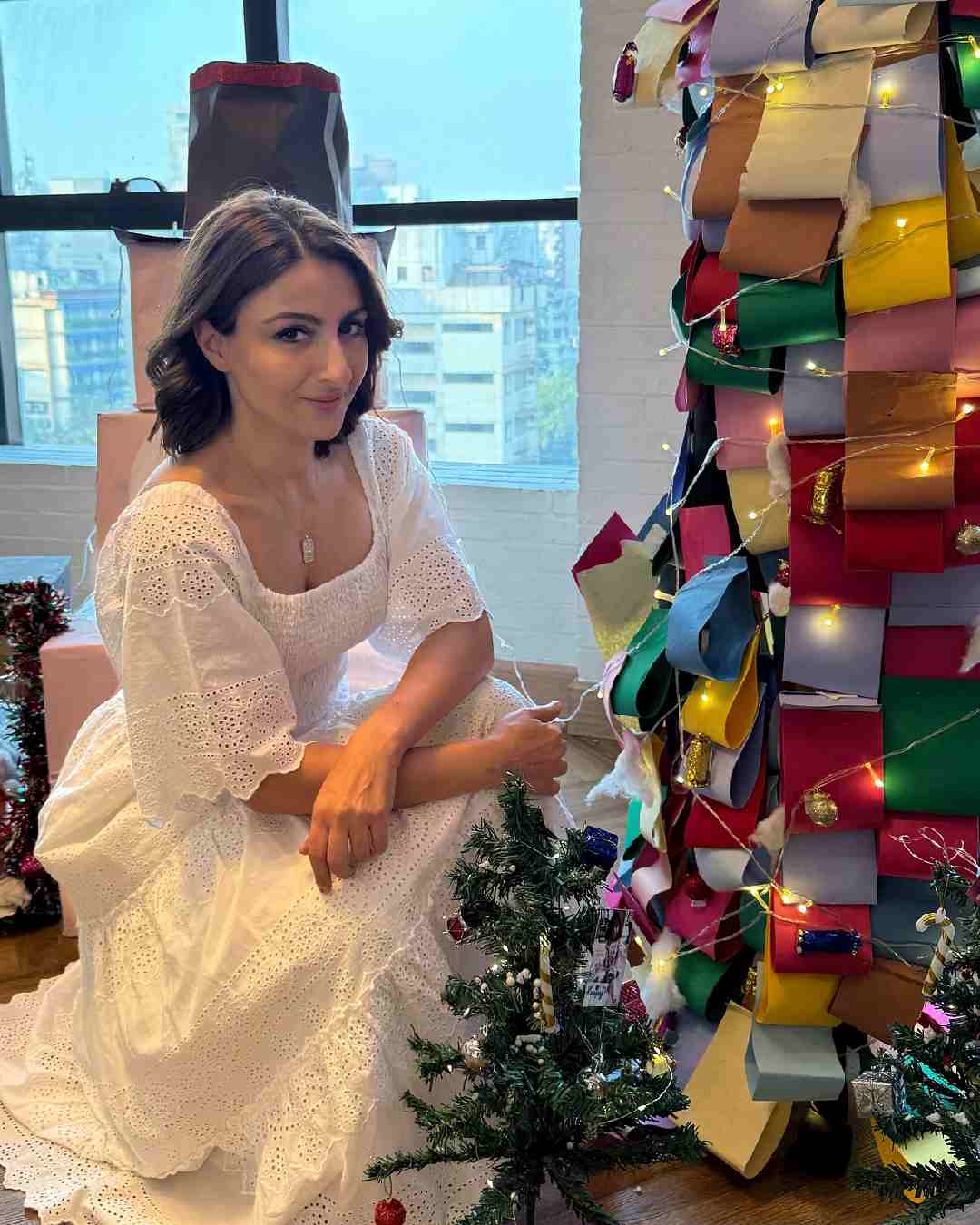 Soha Ali Khan looked gorgeous in a white dress as she posed in a room filled with presents and Christmas decorations.