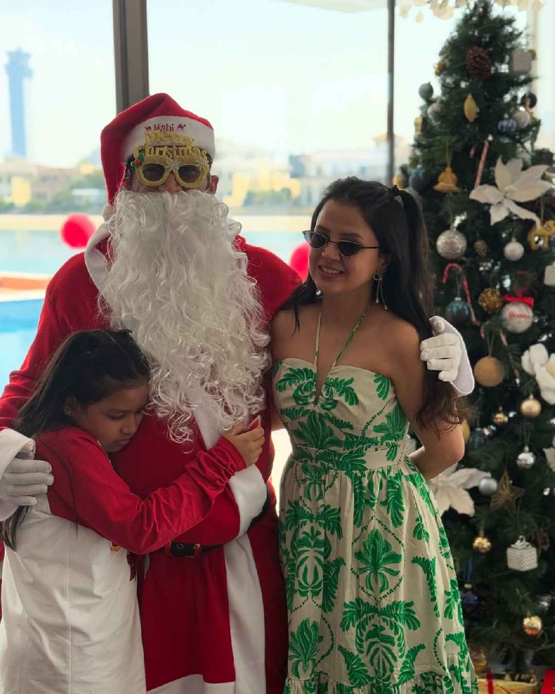 Dhoni posed for a family picture with Sakshi and Ziva. While Ziva twinned with her dad in a red-and-white ensemble, Sakshi looked gorgeous in a green-and-white halter-neck dress. 