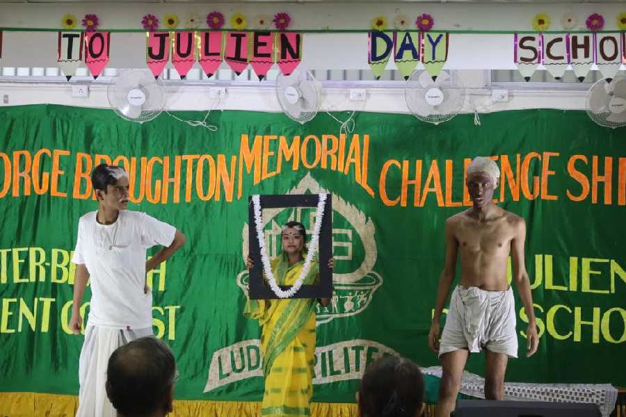 Students stage a play at Julien Day, Calcutta, auditorium