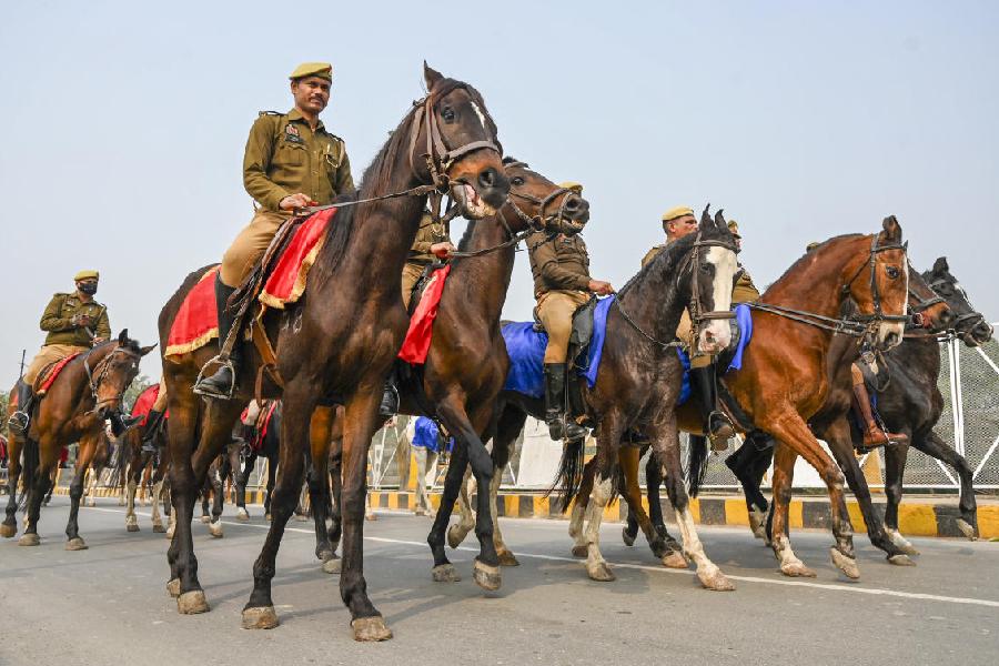 Horse-mounted UP Police personnel keep watch during the 'Peshwai' procession, on Thursday, Dec. 26, 2024. PTI
