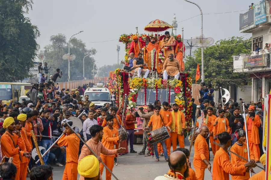 Drums and other instruments welcome the saints. PTI