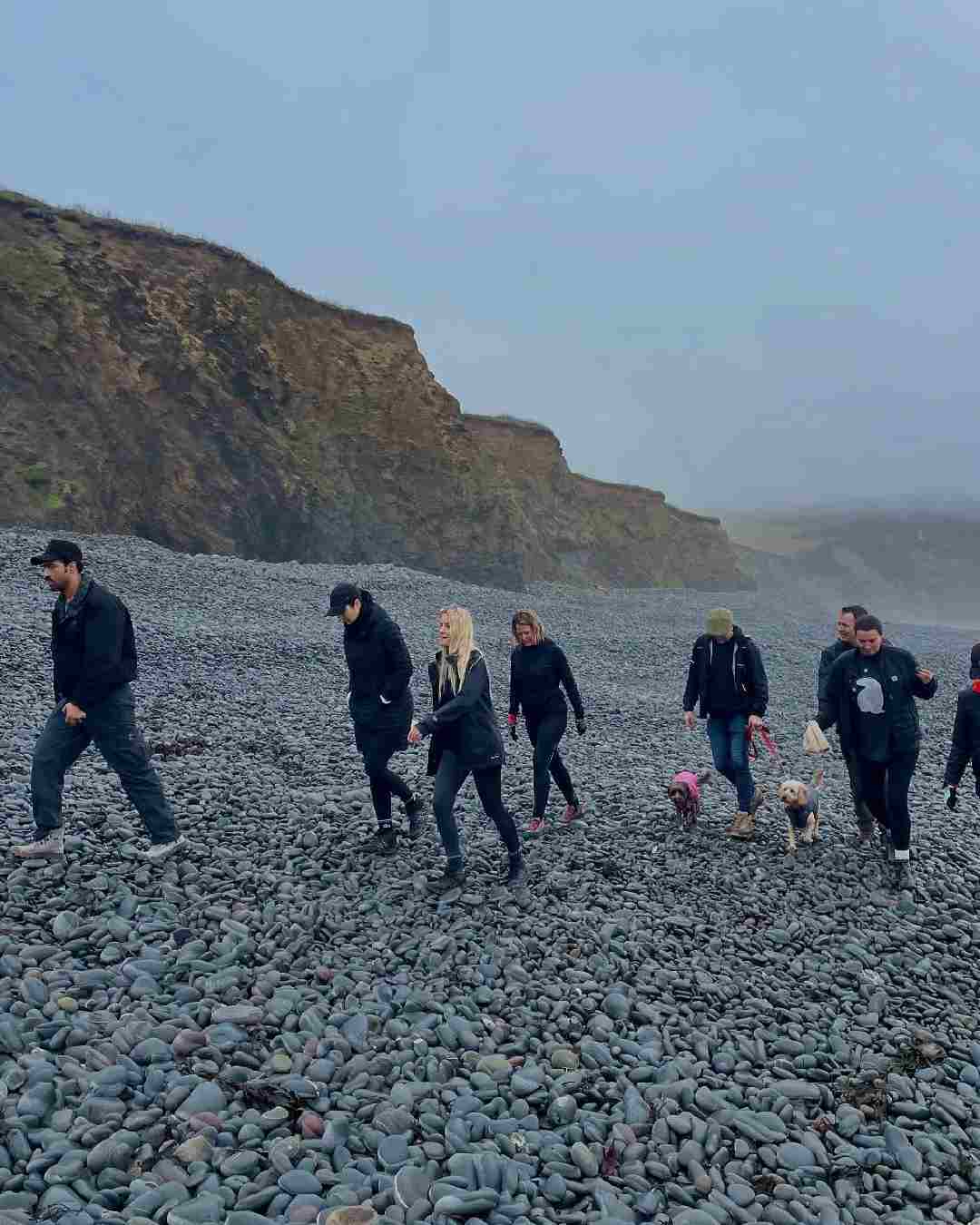 The photo shows Vicky and Katrina trekking up a pebble-strewn path with friends and family. The couple celebrated their third marriage anniversary on December 9. 