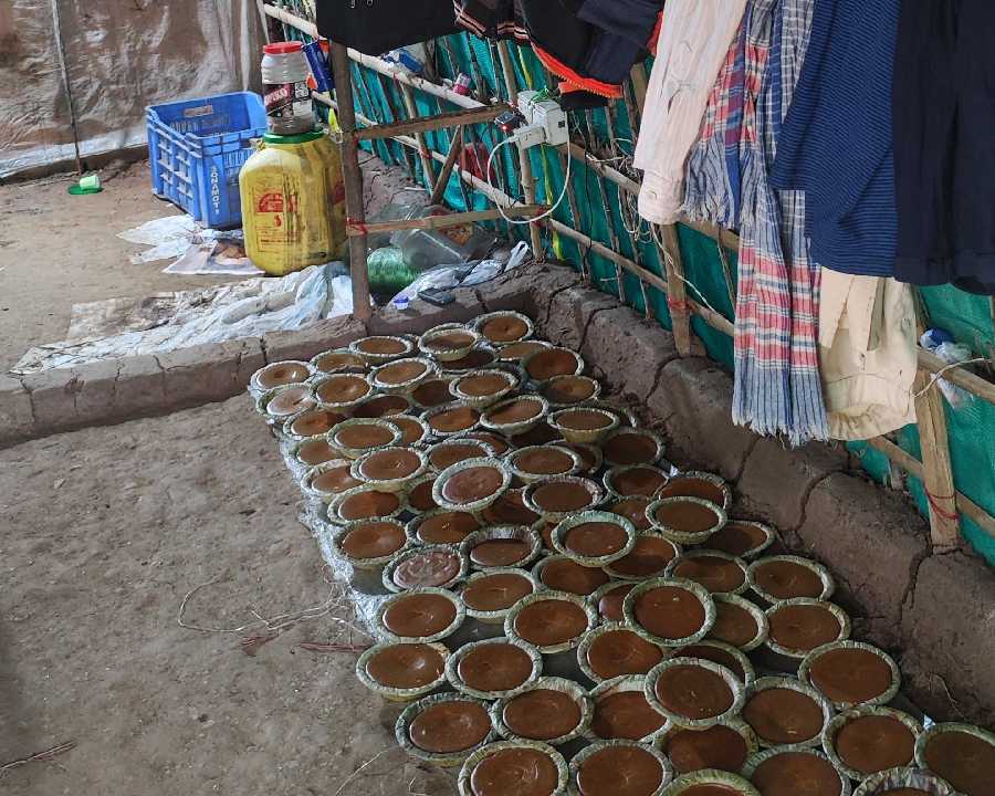 Jaggery in the making from palm juice at a village in Belpahari, Jhargram, on Sunday  