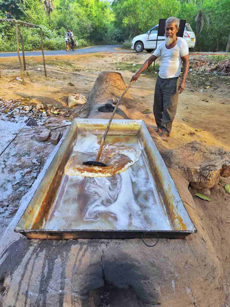 Palm jaggery being made in a village at Belpahari in Jhargram. Palm jaggery is made by boiling the sap from palm trees  