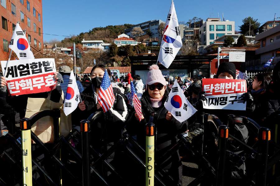 Yoon supporters in a rally. Reuters