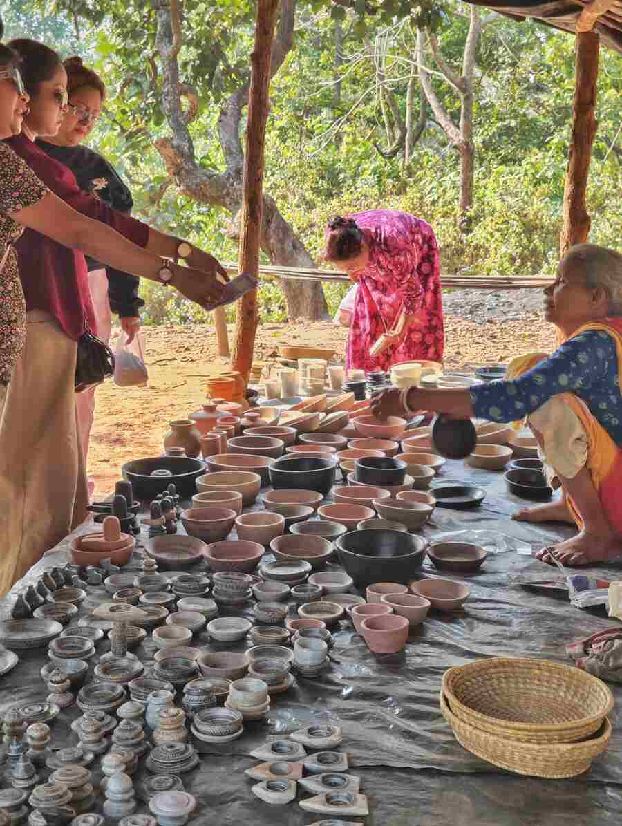 Laterite stones found in the hills of Dankikusum, a village in Belpahari, Jhargram, are painstakingly carved into plates, bowls idols, household items and decorative products by village artisans