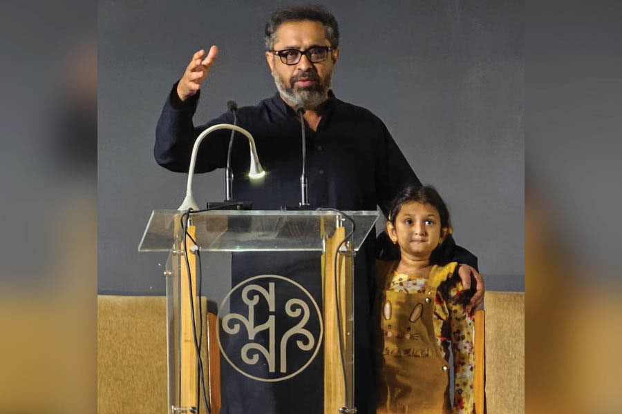 Director Suman Ghosh with child artiste Anumegha Kahali, who plays Mini, at a screening in Nandan, Kolkata