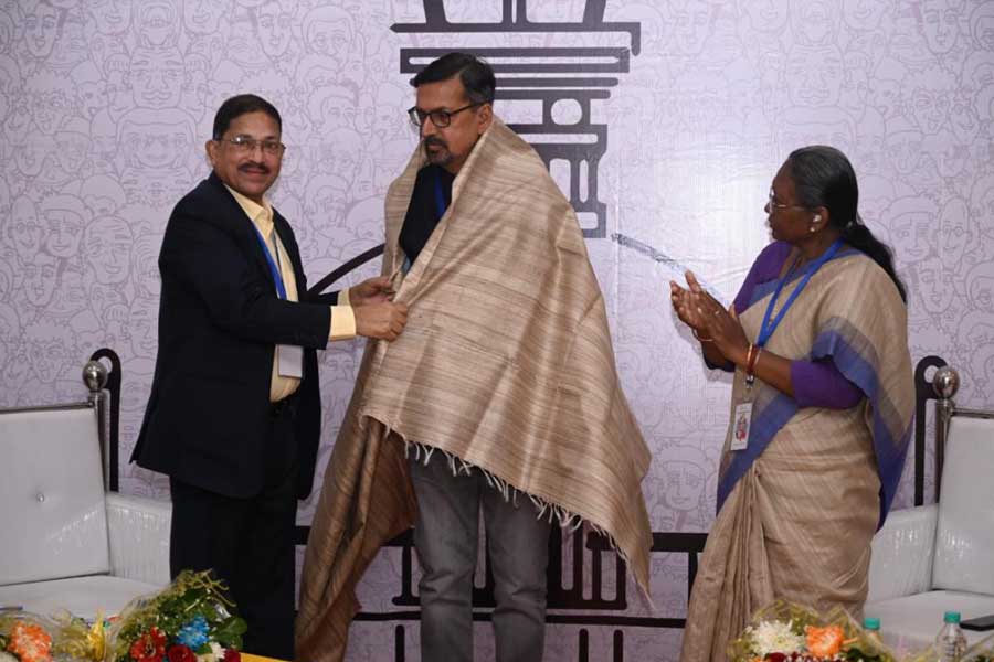 Gopal Lahiri being felicitated at the Toshari Literature Festival on February 3